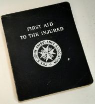A FIRST AID TO THE INJURED book produced by the St John Ambulance Association, 1943 Edition.