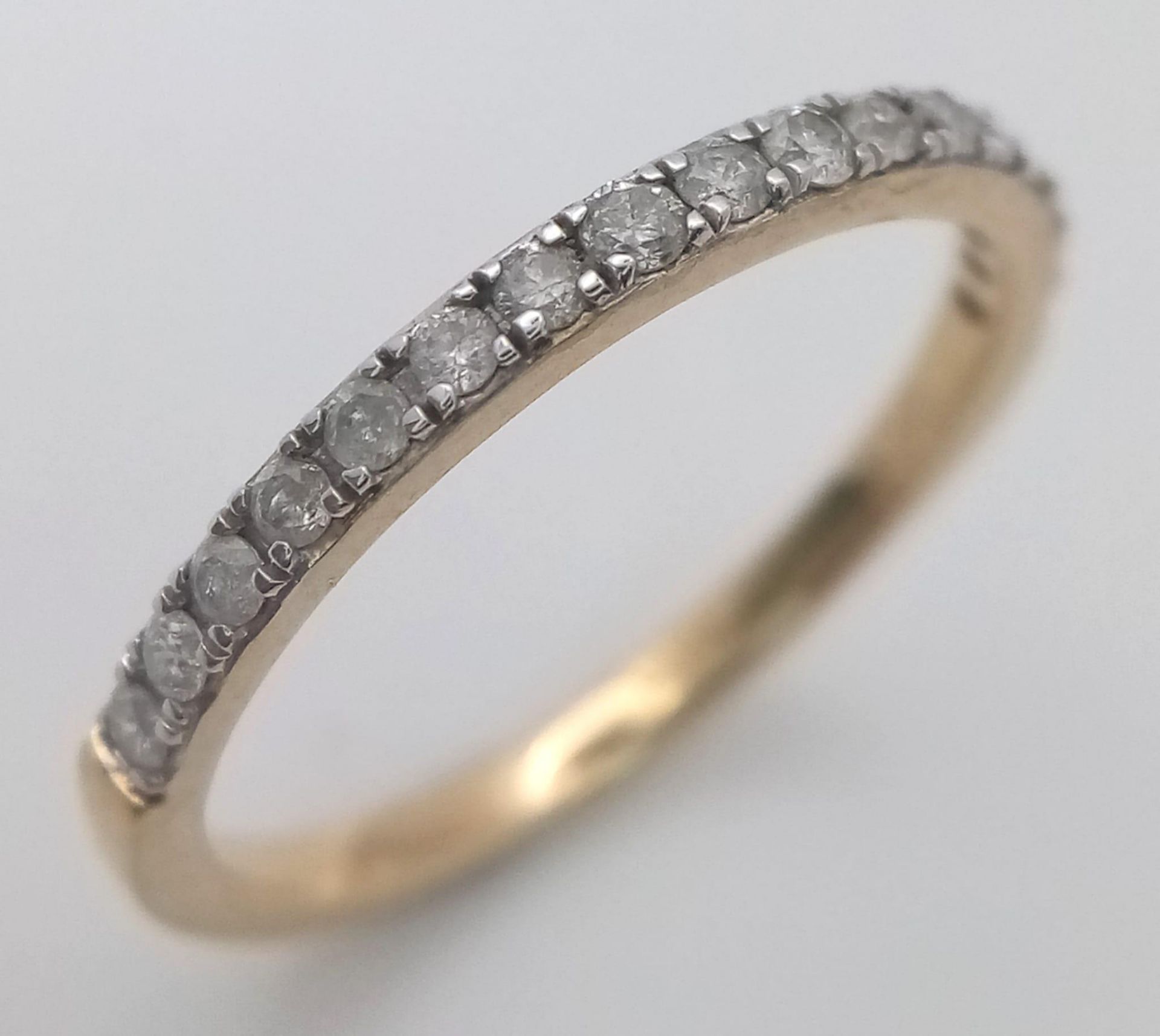 A 9K YELLOW GOLD DIAMOND HALF ETERNITY RING. 0.25CTW. 1.5G. SIZE N. - Image 2 of 4