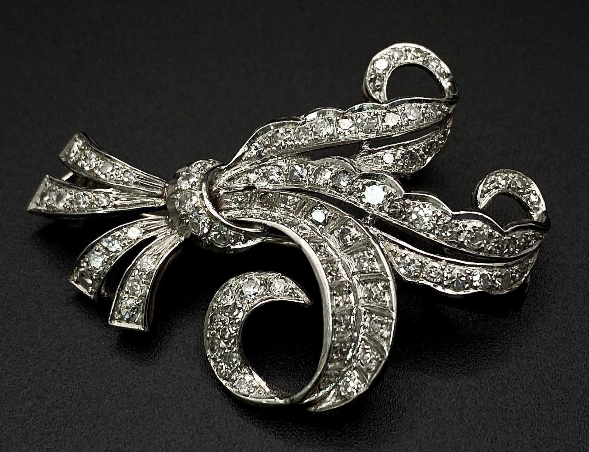 A Vintage Style Platinum and Diamond Elaborate Bow Brooch. 2.2ctw of encrusted diamonds. 10.7g total - Image 4 of 7