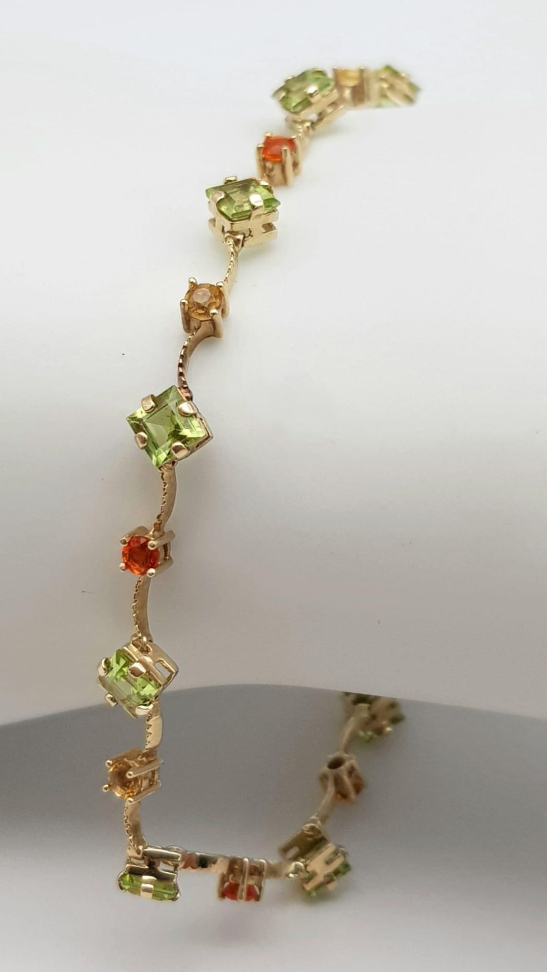 A 14K Yellow Gold Multi Coloured Gemstone Set Bracelet. 18.5cm length, 4.2g total weight. Ref: SC - Image 3 of 6