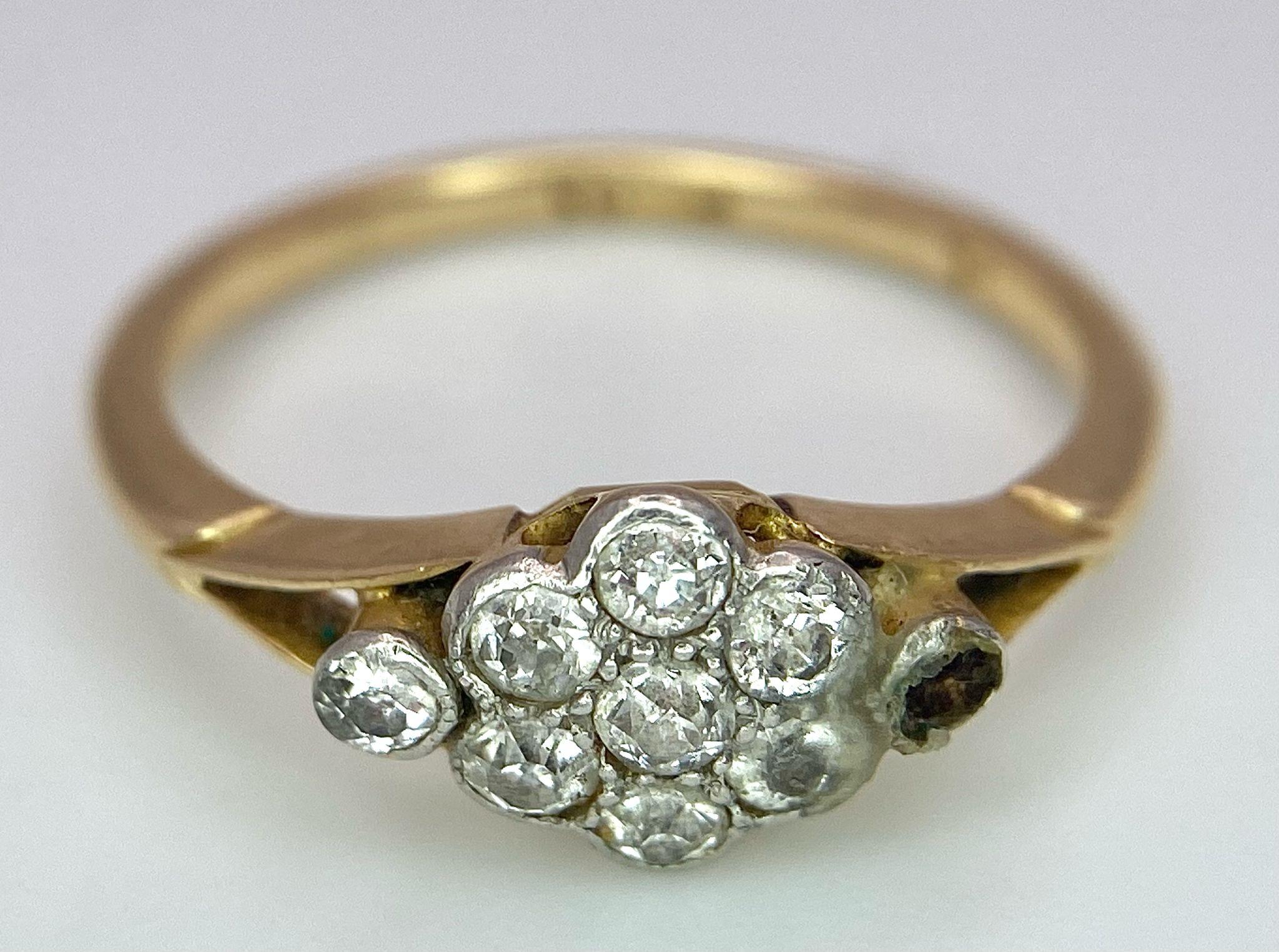 A VINTAGE 18K GOLD DIAMOND CLUSTER RING (ONE STONE MISSING REFLECTED IN PRICE) . 2.4gms size J - Image 7 of 11