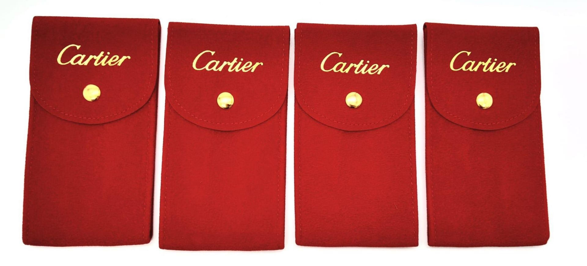 Four CARTIER service pocket pouches, with inserts, ideal for traveling or protecting your valuable