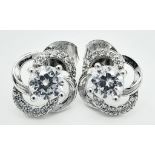 A fancy pair of 925 silver CZ earrings. Total weight 2.25G.