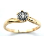 An 18K Yellow Gold Diamond Cluster Ring. Size O, 2.7g total weight. Ref:8456