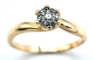 An 18K Yellow Gold Diamond Cluster Ring. Size O, 2.7g total weight. Ref:8456