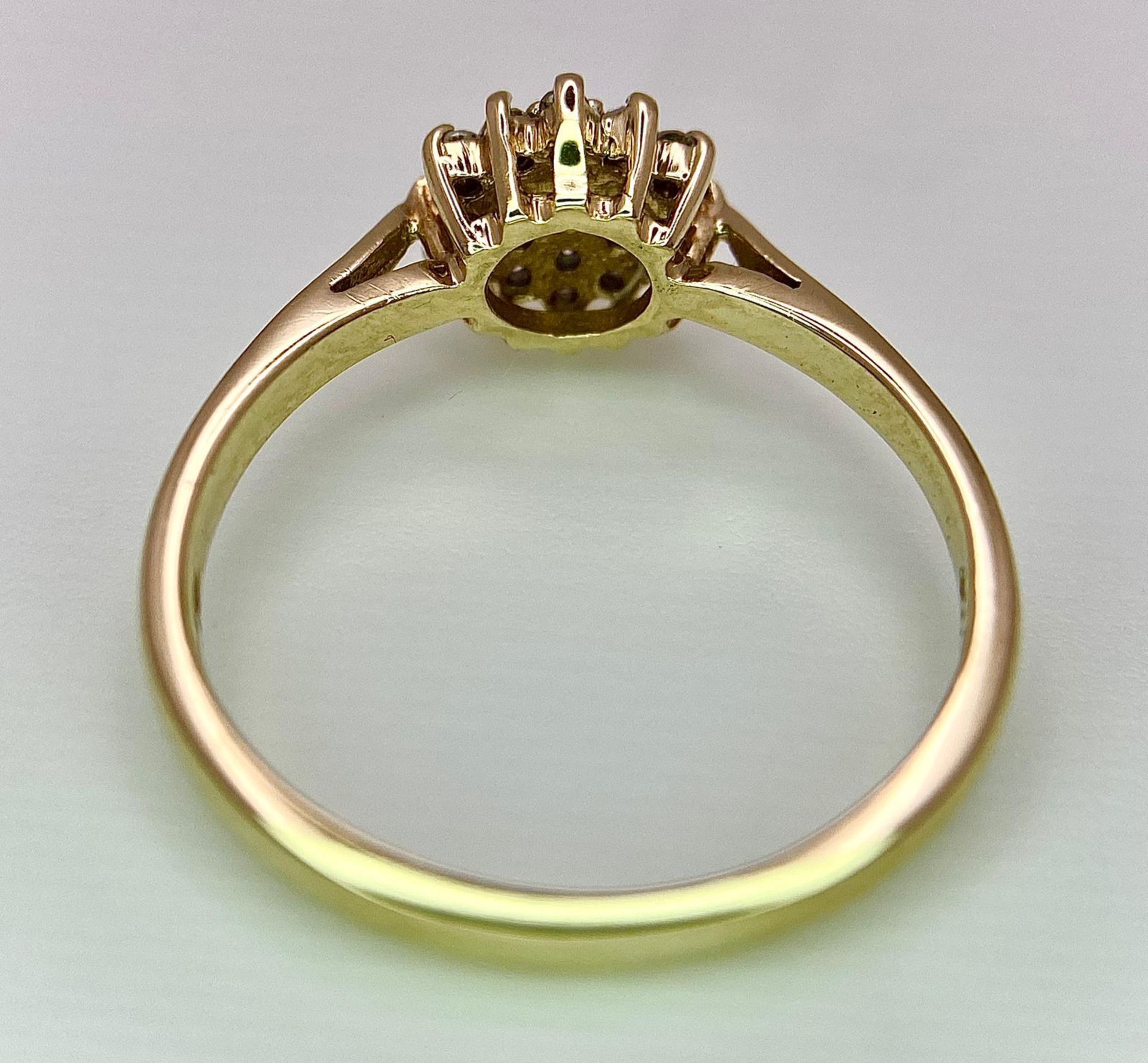 A 9K YELLOW GOLD DIAMOND CLUSTER RING. 0.15CT. 2.2G. SIZE P. - Image 9 of 13