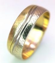 A 14K Yellow Gold Band Ring with Swirl Decoration. Size O. 2.9g weight.