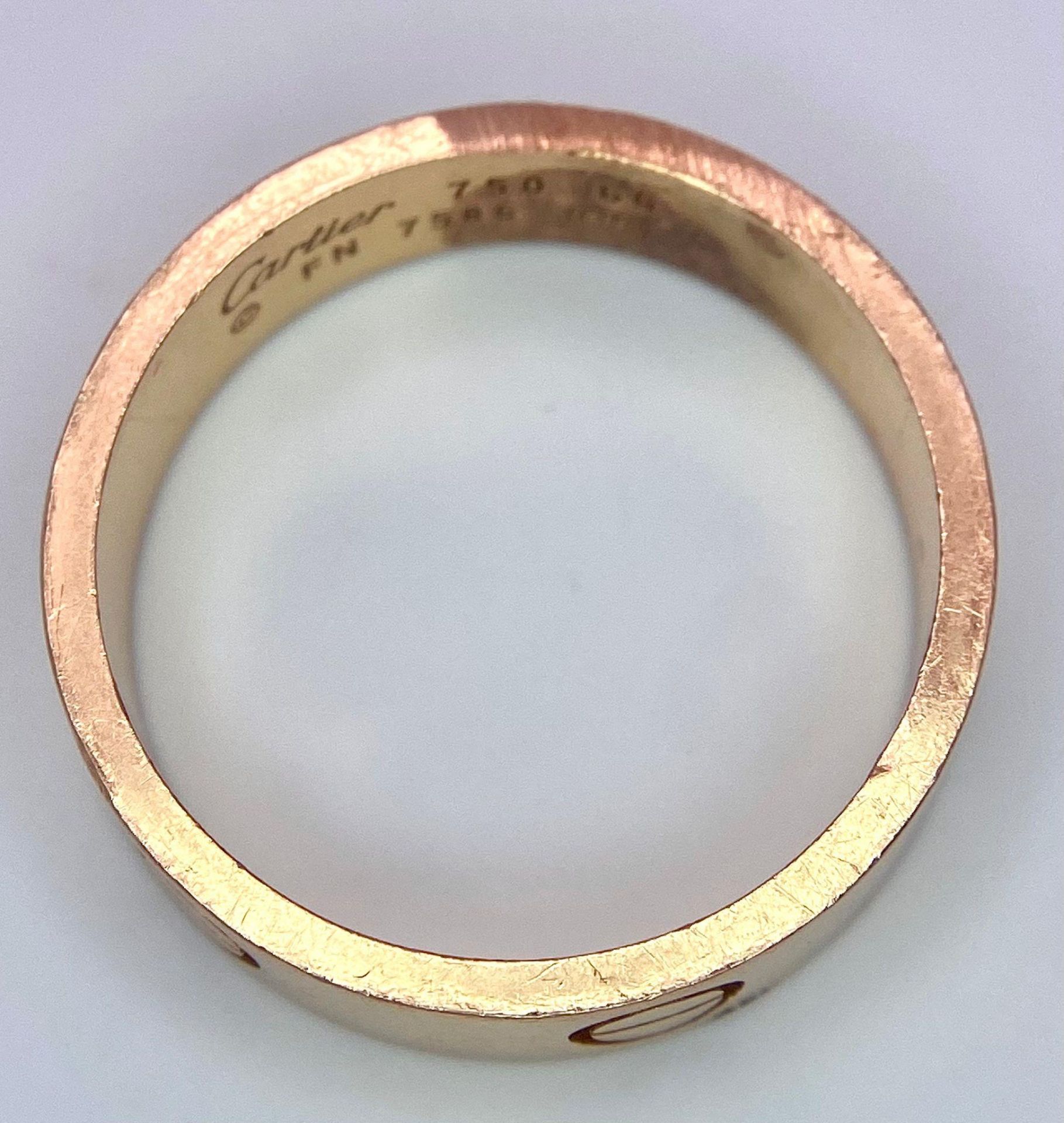 A Cartier 18K Rose Gold Love Band Gents Ring. 6mm width. Cartier hallmarks. Size W. 8.6g weight. - Image 8 of 9