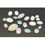 A Parcel of 20 Opals. Assorted Sizes up to 1cm, Oval Cuts, 6.25 Carats.