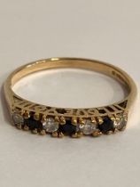 9 carat GOLD RING set with SPINEL and ZIRCONIA Gemstones. Full UK hallmark. Complete with ring