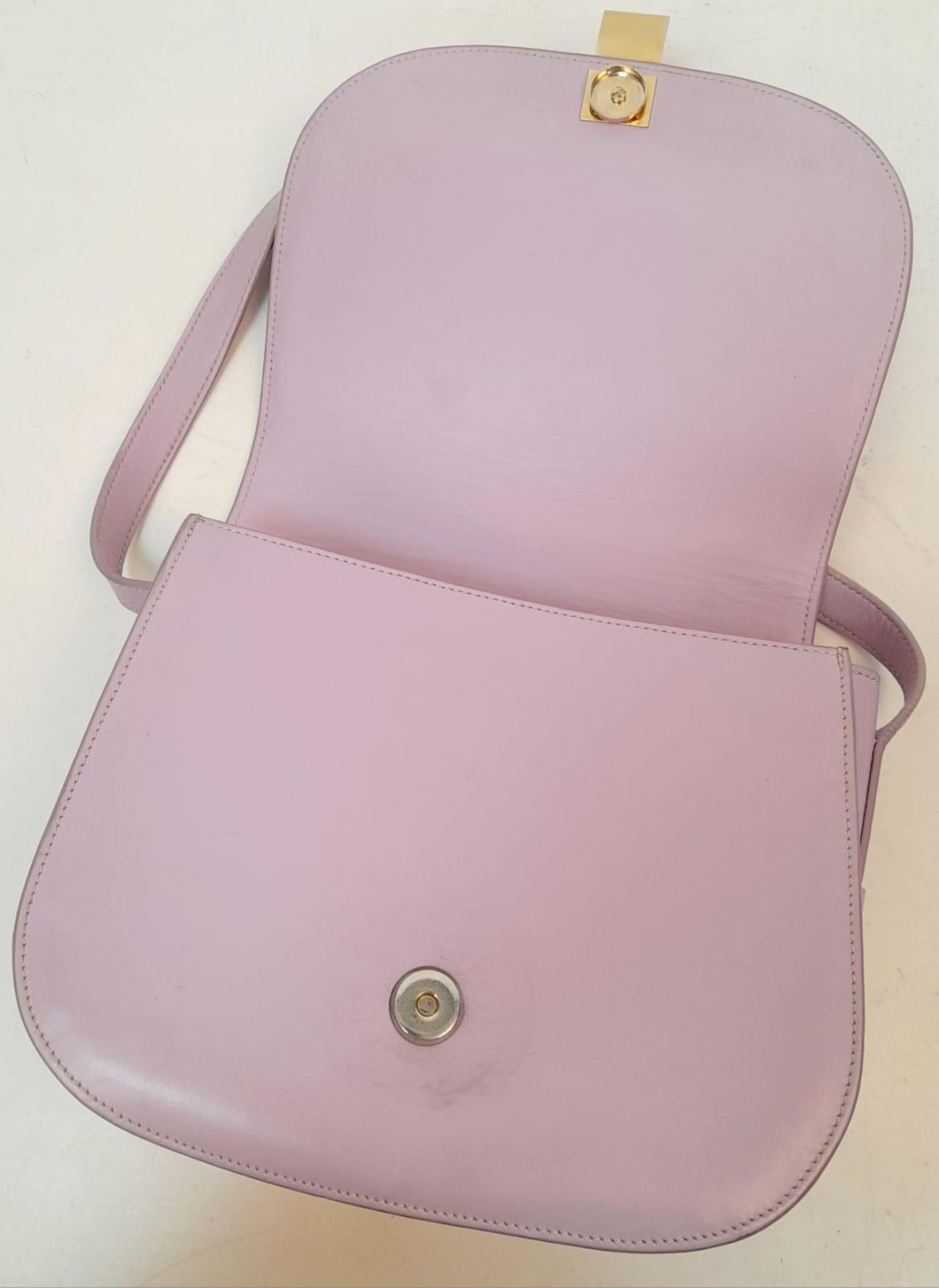 A Paul & Joe Lilac Saddle Bag. Leather exterior with adjustable strap, open compartment on back, and - Image 2 of 6
