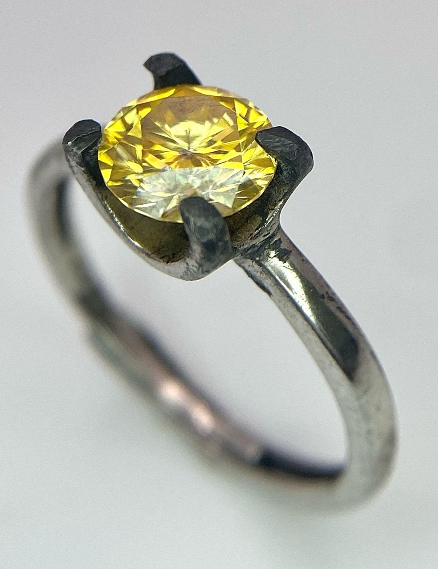 A 1ct Yellow Moissanite Solitaire Ring - Set in 925 Silver. Comes with a GRA certificate. Size L.