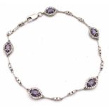 An elegant 18 K white gold bracelet with marquise cut sapphires and round cut diamonds, length: 19.5