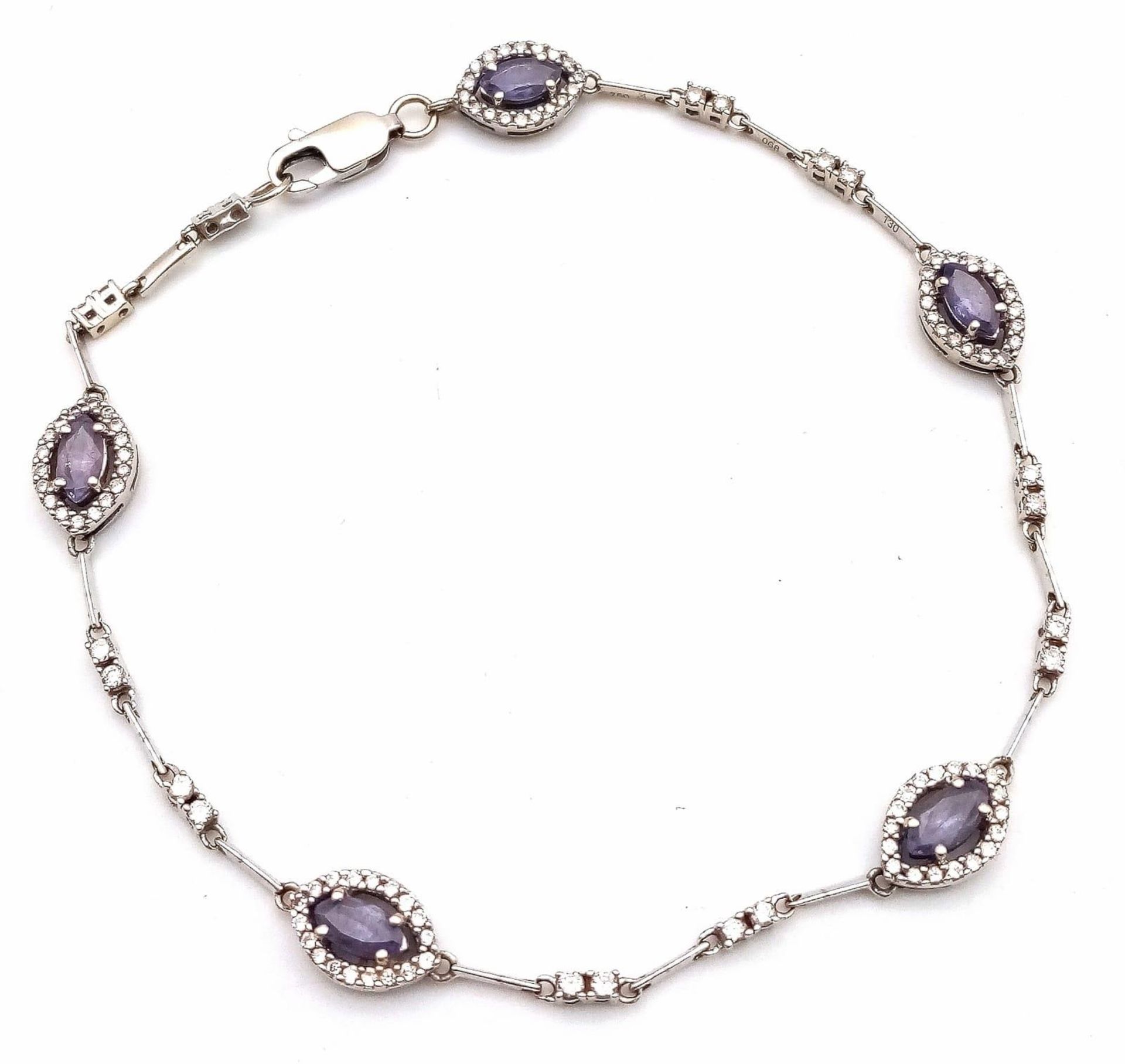 An elegant 18 K white gold bracelet with marquise cut sapphires and round cut diamonds, length: 19.5