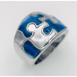 A Sterling Silver Jigsaw Design Stone Set Ring. Size Q, 14.6g total weight. Ref: 8272