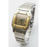 A Vintage Cartier Santos Galbee Bi-Metal Quartz Ladies Watch. Gold and stainless steel bracelet