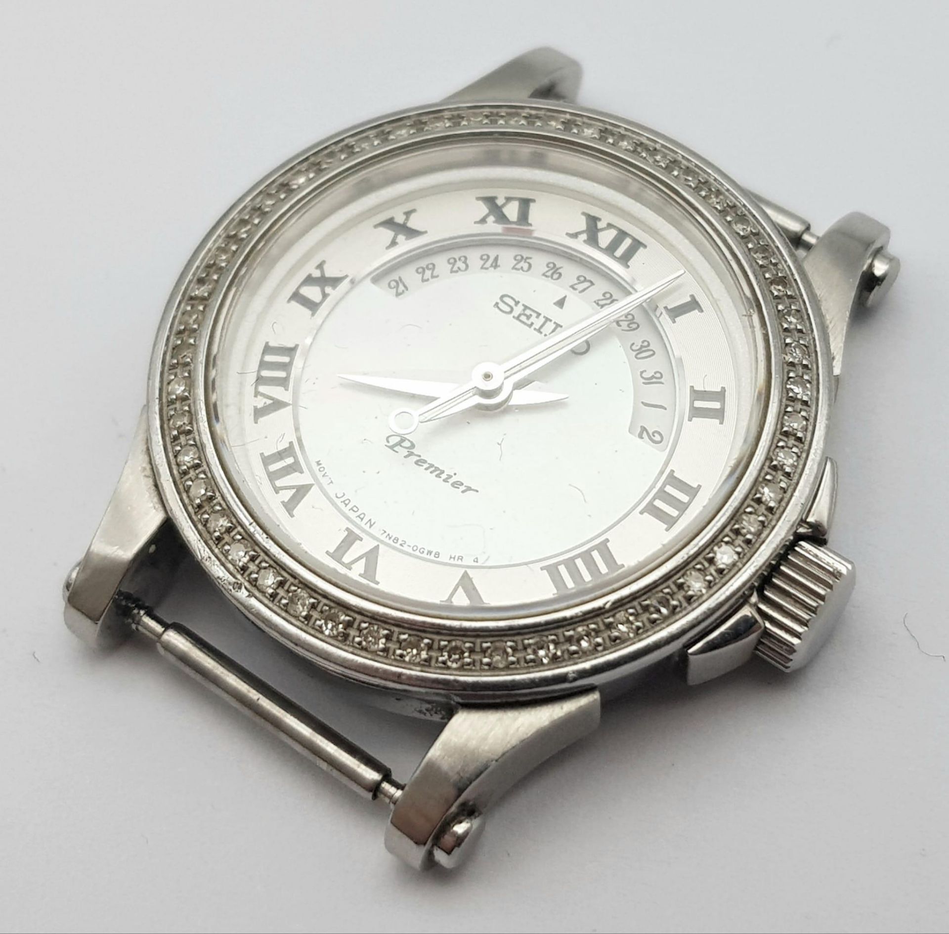 A Seiko Premier Ladies Diamond Watch Case. 27mm. Diamond bezel. Mother of pearl dial. In working