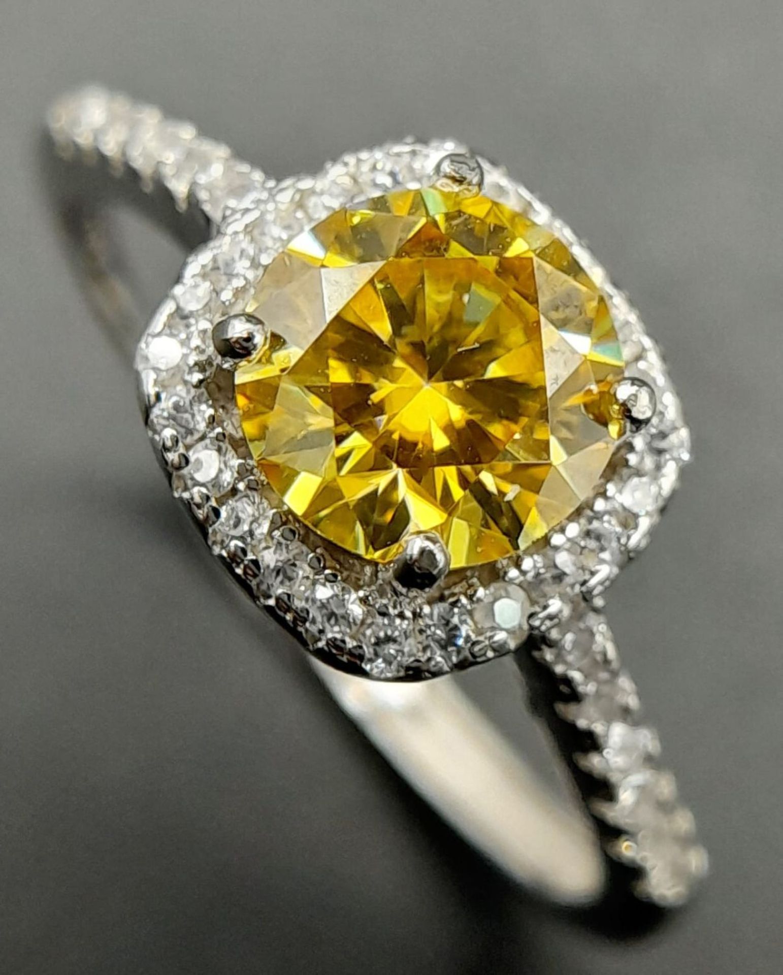 A 1ct Golden Yellow Moissanite Ring. VVS1 Grade. Comes with a GRA certificate. Size N.