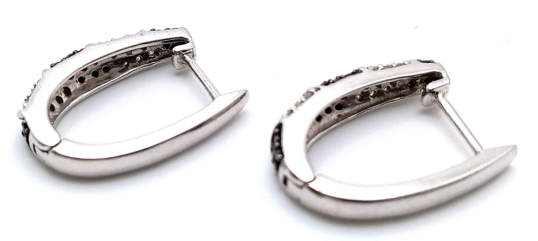 A Pair of 9K White Gold, Black & White Diamond Set Earrings. 0.40ctw, 2cm length, 5g total weight. - Image 2 of 9
