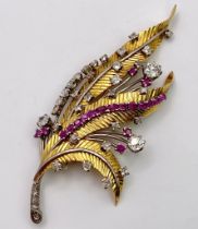 A Spectacular 18K Gold (tested) Diamond and Ruby Leaf Brooch. 3ctw of brilliant round cut diamonds