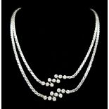 A Beautiful 14K White Gold and Diamond Two Row Necklace. 18 diamonds - 3.6ctw of brilliant round cut