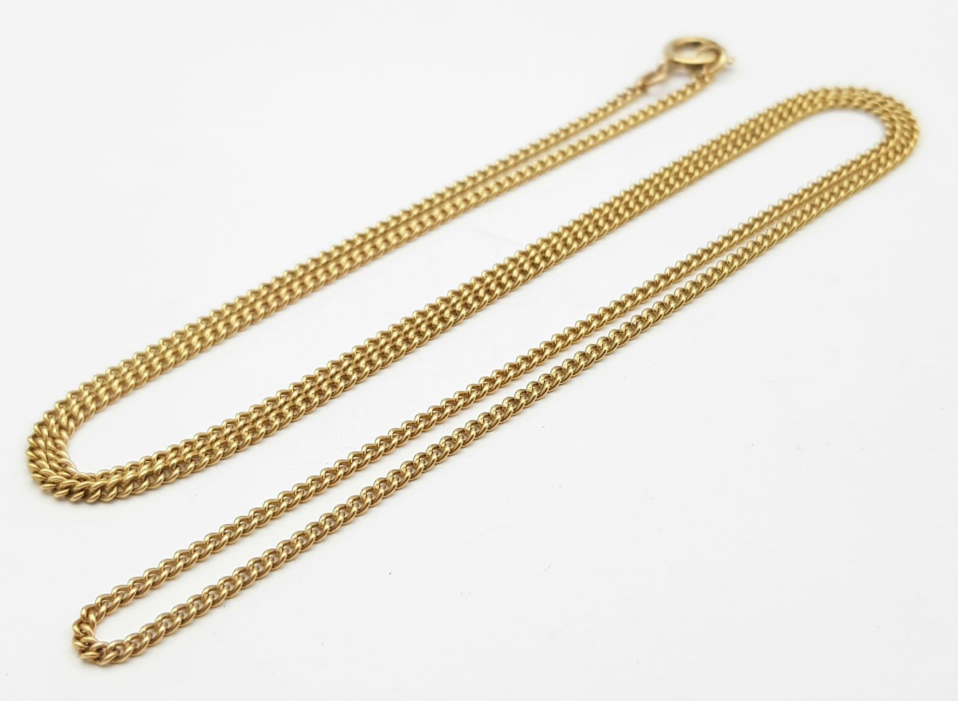 A 9K Yellow Gold Small Curb Link Necklace. 50cm length. 3.66g weight.