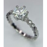 A VVS1 1ct White Moissanite Ring set in 925 Silver. Size P. Comes with a GRA certificate.