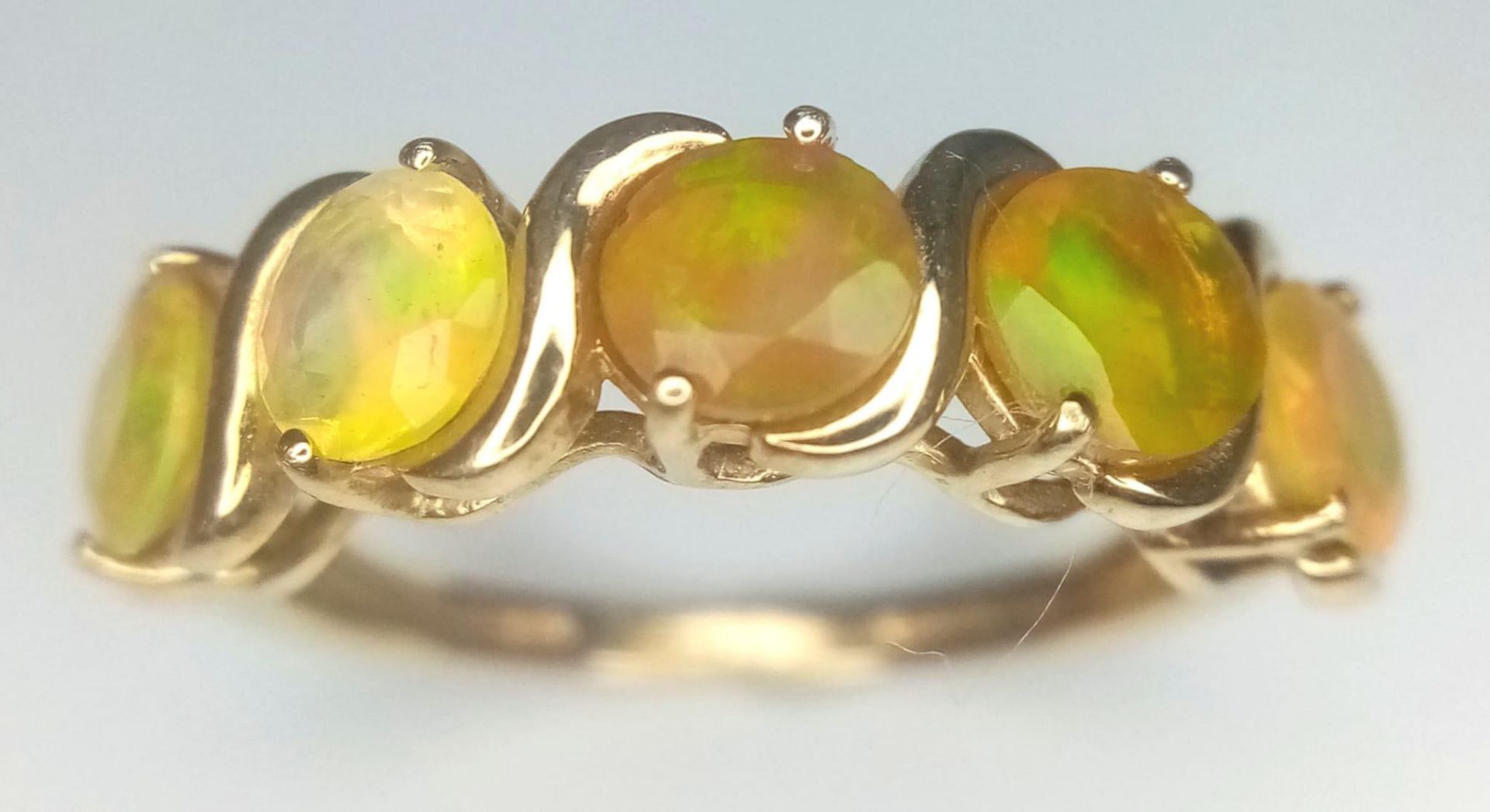 A VERY ATTRACTIVE 5 GEMSTONE RING IN 9K GOLD . 2.8gms size O