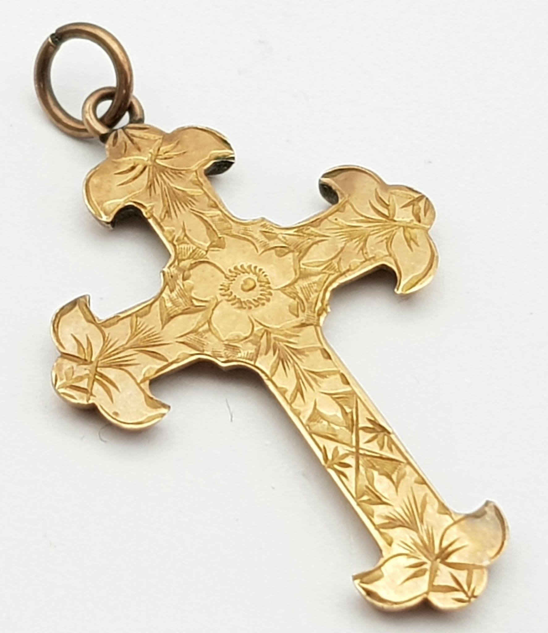 A Vintage 9K Yellow Gold Cross Pendant. 3.5cm. 1.1g weight.