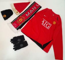 A Collection of Manchester United Clothing: Nike Red Shirt - AIG (XL), Scarf, Xmas Hat, Beenie hat