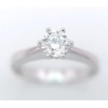 AN 18K WHITE GOLD DIAMOND SOLITAIRE RING - 0.50CT. 6 CLAW SETTING. 3.9G. SIZE N