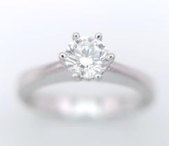 AN 18K WHITE GOLD DIAMOND SOLITAIRE RING - 0.50CT. 6 CLAW SETTING. 3.9G. SIZE N