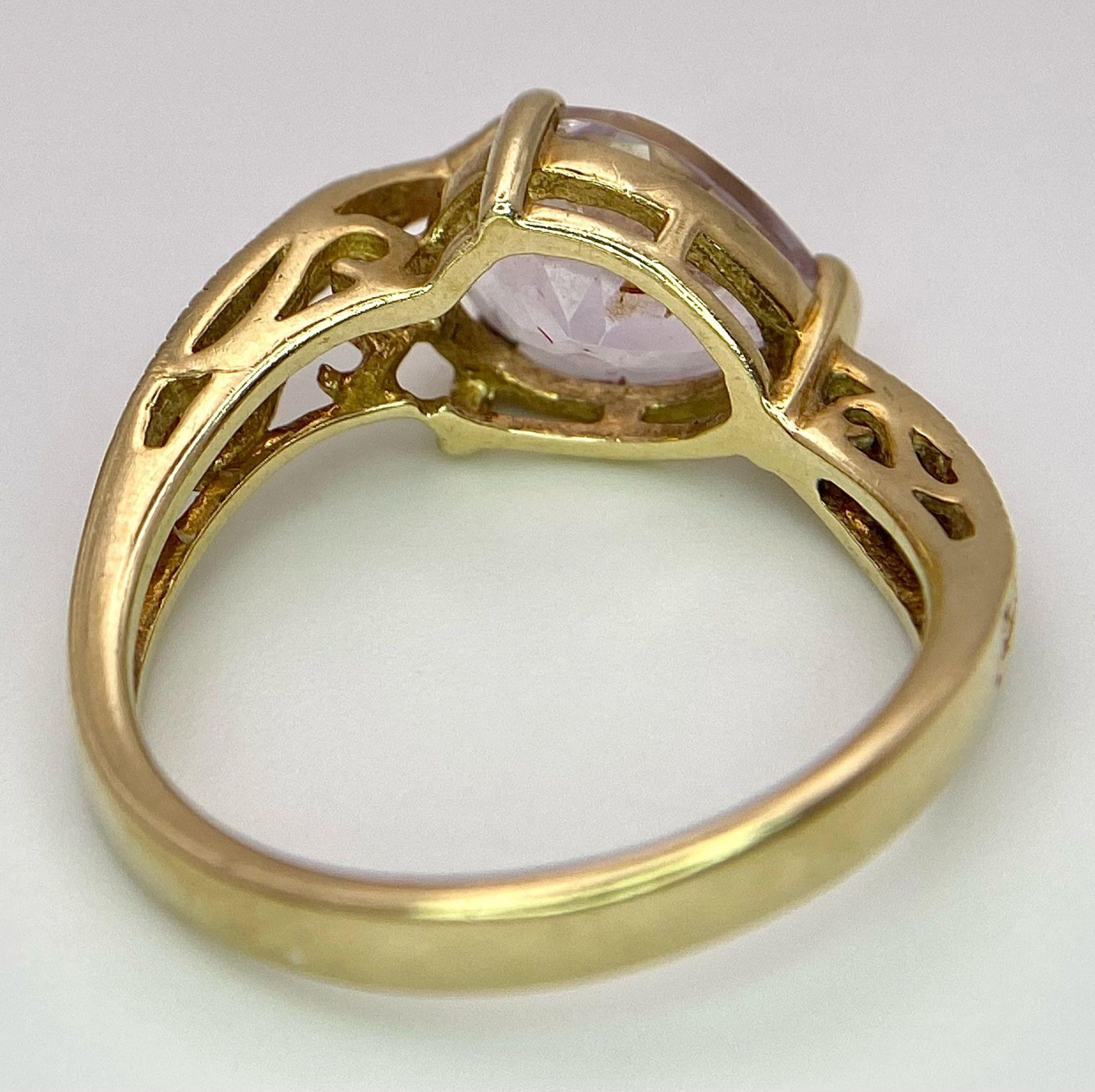 A9K GOLD SERPENT SHAPED RING WITH LARGE AMETHYST STONE . 3.7gms size O - Image 4 of 6