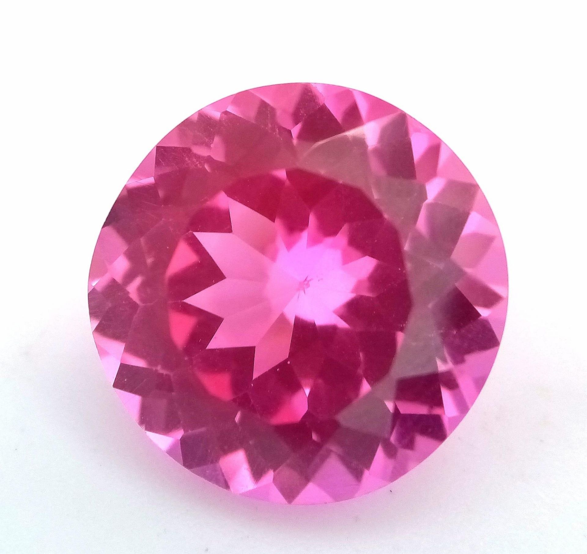 A Beautiful 18ct Pink Kunzite Gemstone. Round cut. No visible marks or inclusions. No certificate so