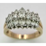 A 9K GOLD 3 ROW DIAMOND CLUSTER RING . 5.4gms size P