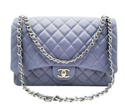 A Chanel Jumbo Double Flap Maxi Bag. Blue quilted caviar leather exterior with a large slip pocket