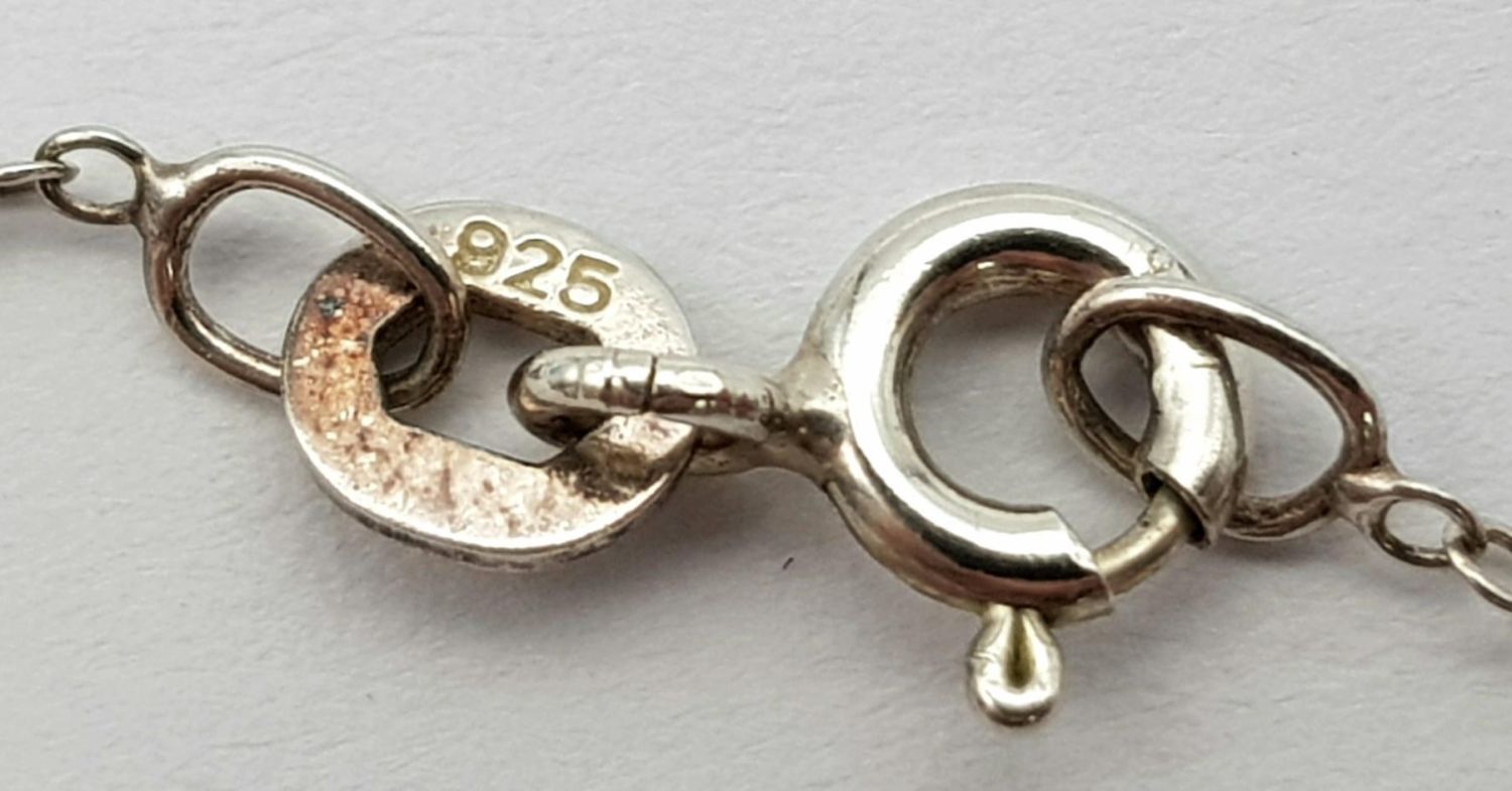 A vintage 925 silver bull pendant on silver belcher chain. Total weight 3.1G. Total length 42cm. - Image 8 of 8