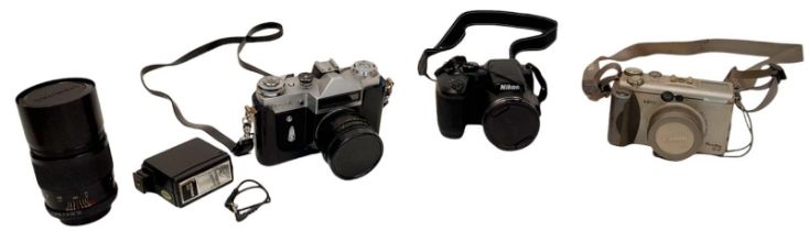 A Selection of Vintage 35mm and Digital Cameras - Please see photos for finer details. A/F.