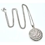 A vintage 925 silver locket pendant on silver chain. Total weight 16.16G. Total length 67cm.