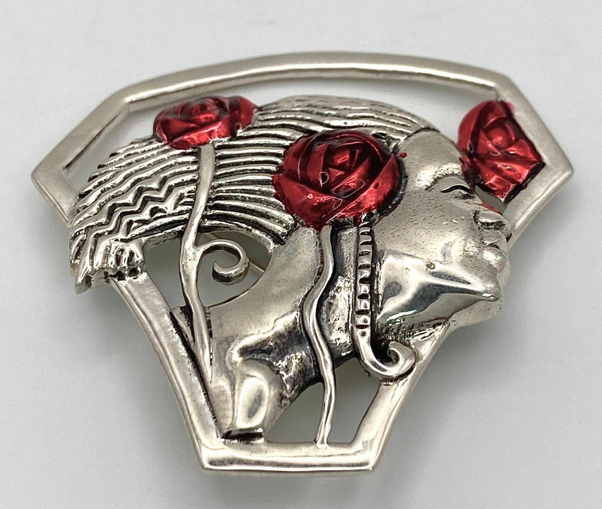 A Sterling Silver, Art Noveau Design, Enameled Red Roses on Figurine. 41mm Length. 10.96 Grams. - Image 2 of 8