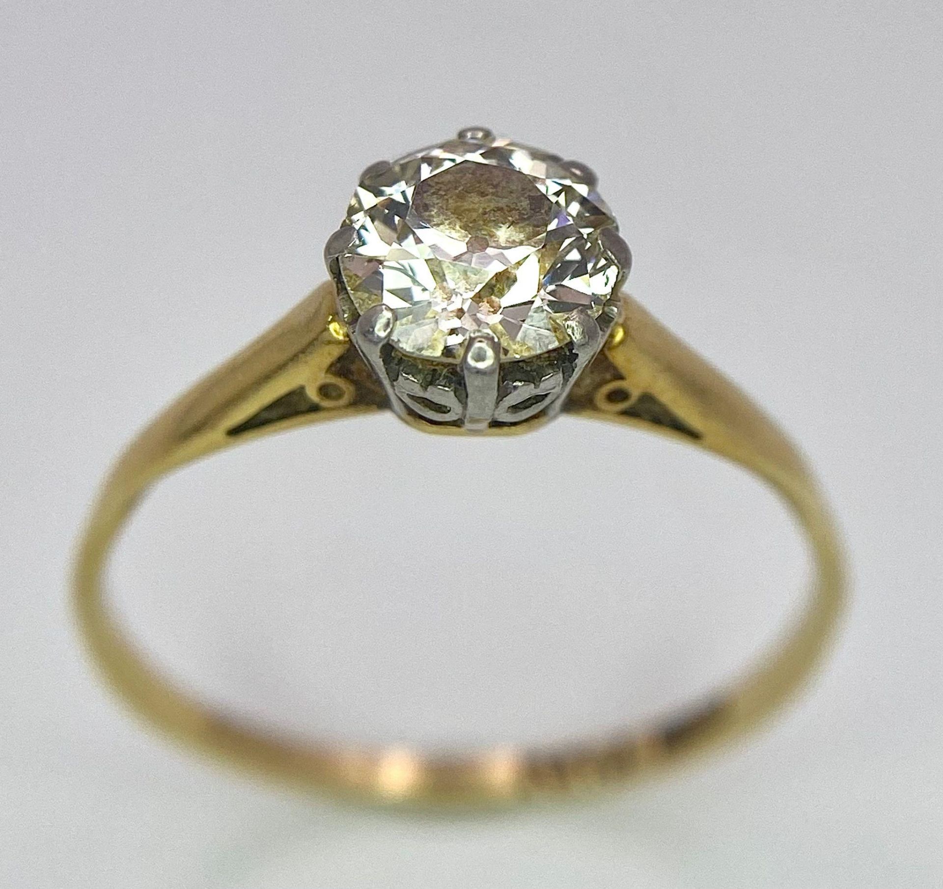 A Vintage 18K Yellow Gold and Platinum Diamond Solitaire Ring. 1ct brilliant round cut diamond. Size