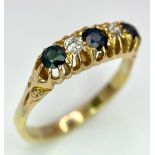 An 18K Yellow Gold Sapphire and Diamond Ring. Size Q. 3.9g