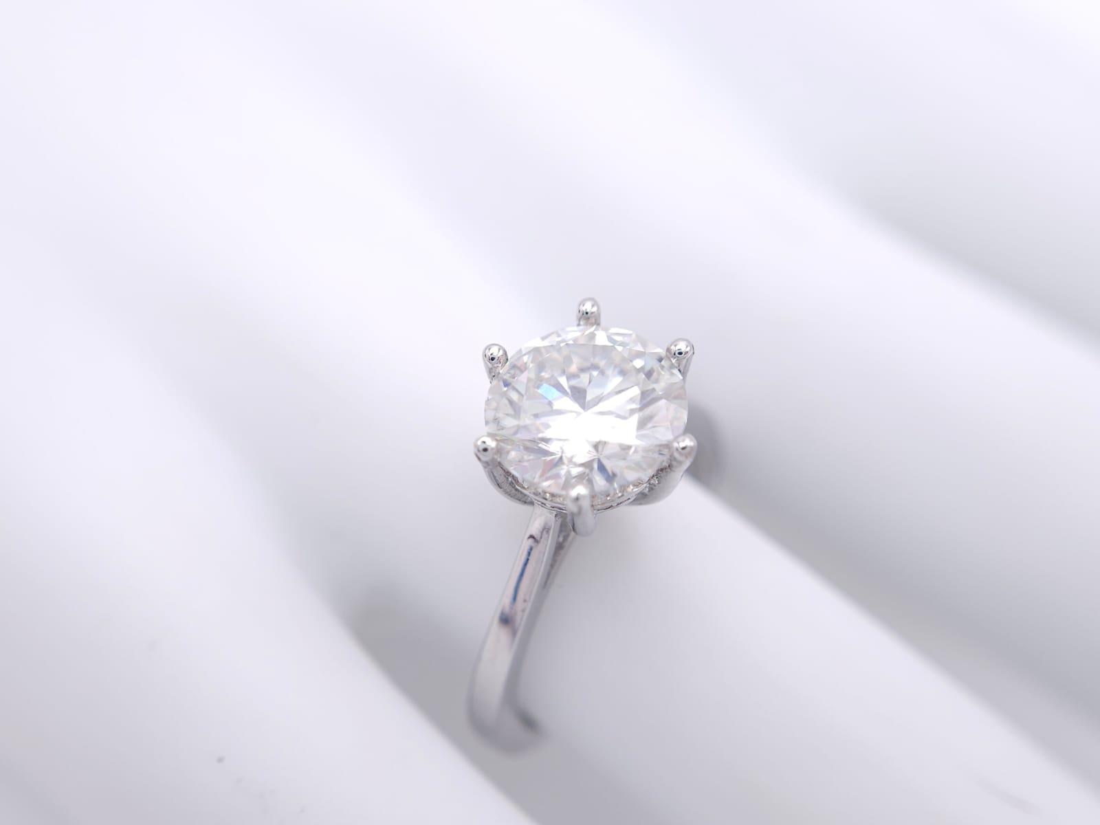 A sterling silver solitaire ring with a stunning round cut moissanite (3 carats), size: N, weight: - Image 11 of 13