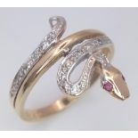 A 9K YELLOW GOLD WHITE STONE SET SNAKE RING. 3G. SIZE S.