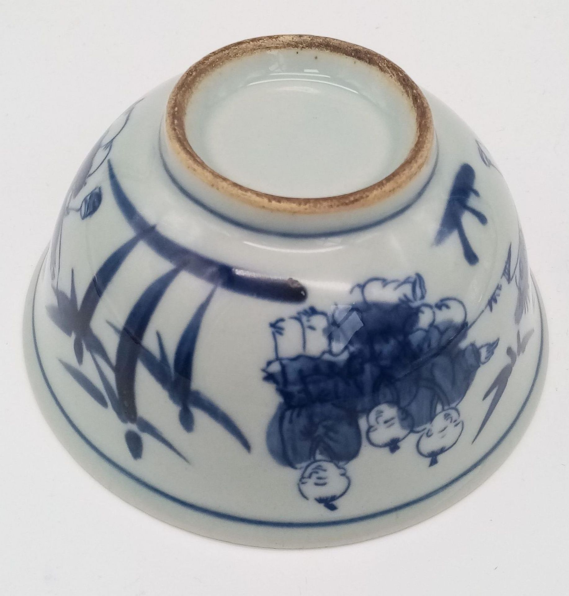 A Chinese blue and white hand painted bowl decorated with children playing with birds. White - Image 5 of 6