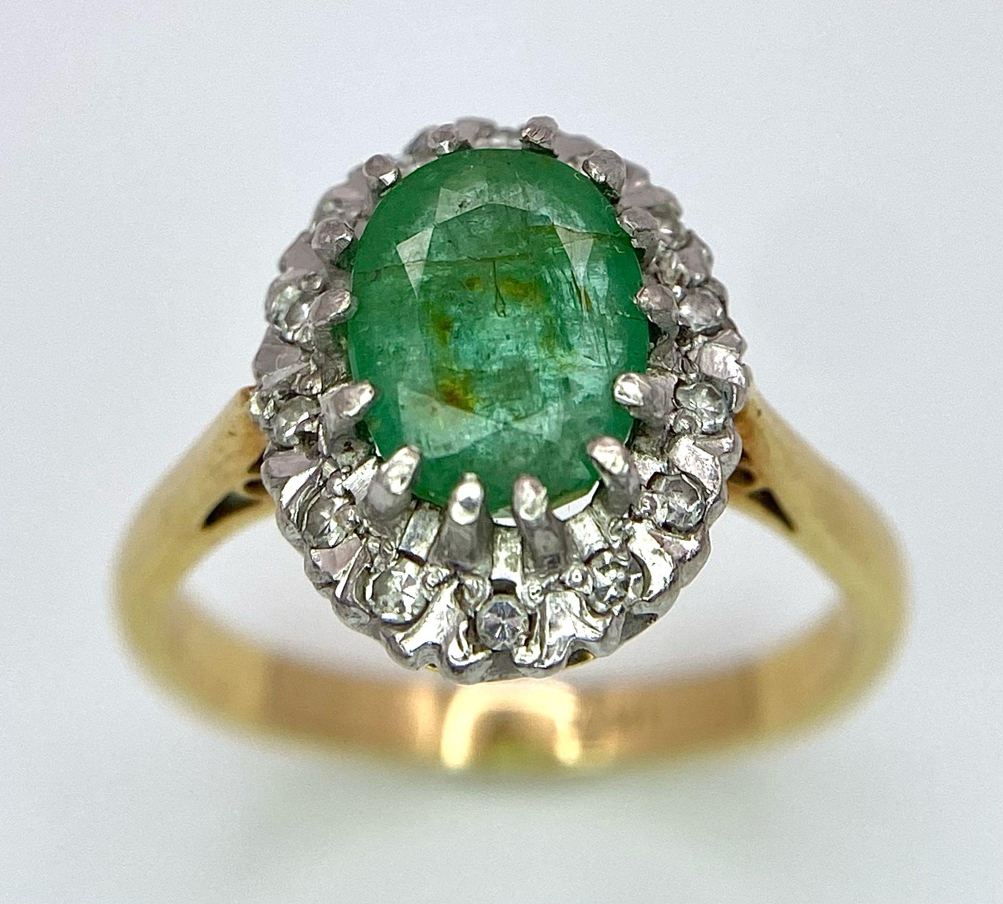 An 18K Yellow Gold, Emerald and Diamond Ring. Central 2ct emerald with a diamond surround. Size J. - Image 3 of 7