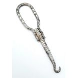 An Antique Folding Boot Hook Fastener.