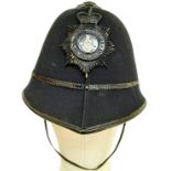 A Vintage Huntingdon Constabulary Police Helmet. Original badge.