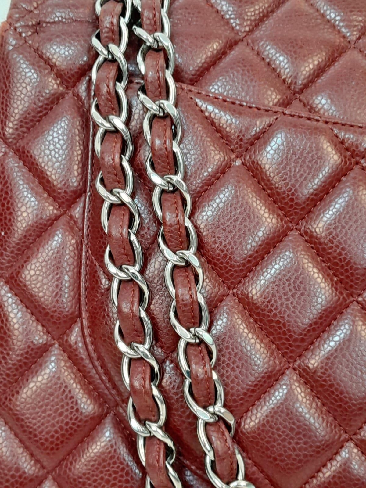 A Chanel Burgundy Jumbo Classic Double Flap Bag. Quilted leather exterior with silver-toned - Image 9 of 16