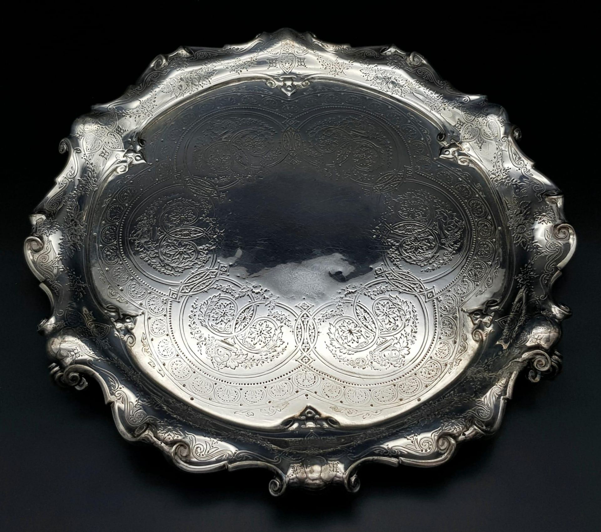 A 761gms solid silver Salva with scrolled edges and hand chased intricate decoration and - Image 2 of 7